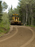 grader on road